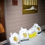 phone books 13 - piled at apt mailboxes