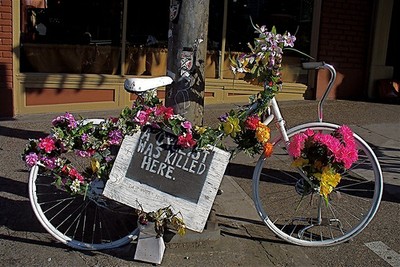 Ghost bike w flowers - Flickr - chrispyworld
