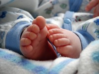 Baby feet by Idaho Editor at MorgueFile