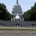 Photo of the US Capitol Building with the fountain in the foreground