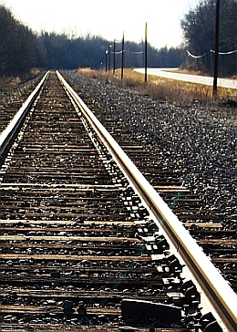 Train tracks receding into distance