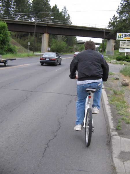 Bicyclist on street with no bike lane