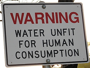 Warning sign: Water Unfit for Human Consumption