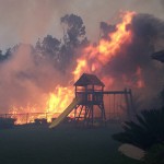 Wildfire rages in somebody's backyard