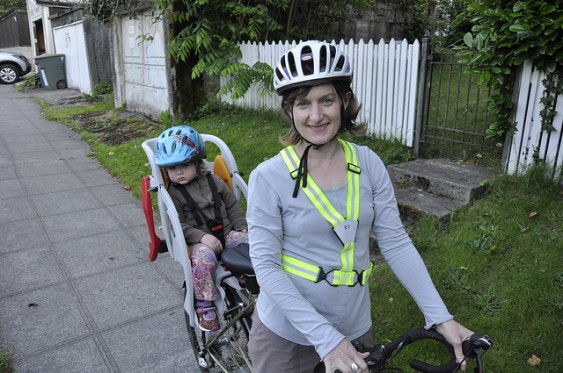 The author and her daughter Audrey in the rear rack bike seat.
