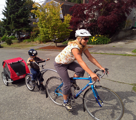 Mom, trail-a-bike, and trailer set-up.