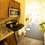 Kitchen and living space in small studio apartment at Freedom Center, Portland.