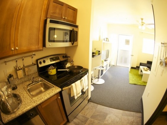 Kitchen and living space in small studio apartment at Freedom Center, Portland.