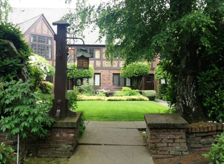 This late-1920s courtyard building in Seattle’s Capitol Hill neighborhood features a landscaped green. Photo by Meaghan Robbins.