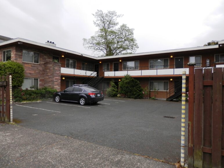 Another apartment with a parking court.