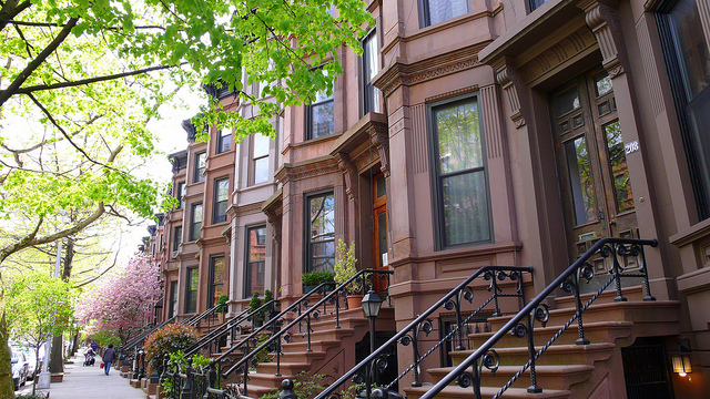 Townhouses with stoops, pedestrian-friendly entrances.