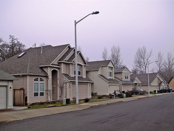 Garages dominate the fronts of single family homes.