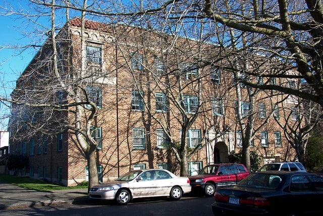 An apartment building built pre-parking requirements.
