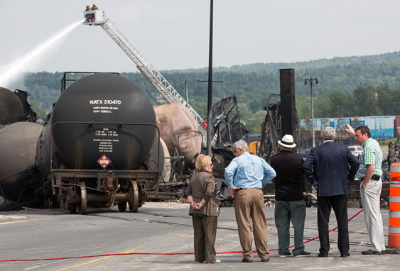 Canadian PM Stephen Harper survey the damage Lac-Mégantic the day after the explosion. Photo credit Stephen Harper, cc.
