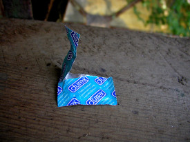 Condom wrapper. Photo credit Sharyn Morrow, cc.