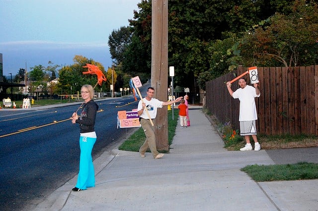 Residents selling space on their property for parking near the Puyallup Fair, Washington.