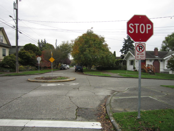 Stop signs at every minor intersection give right-of-way preference to those traveling on the greenway.