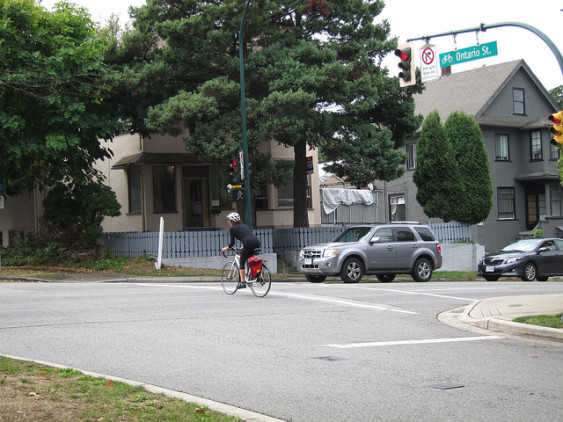 Along Ontario Street, the bikeway has a bicycle-activated traffic signal where it crosses a busy street. Photo by Alyse Nelson, used with permission.