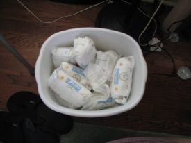 Diapers in the trash, by Inga Munsinger Cotton, cc.