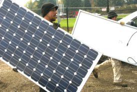 Bringing out the solar panels, by Oregon Dept of Transportation, cc