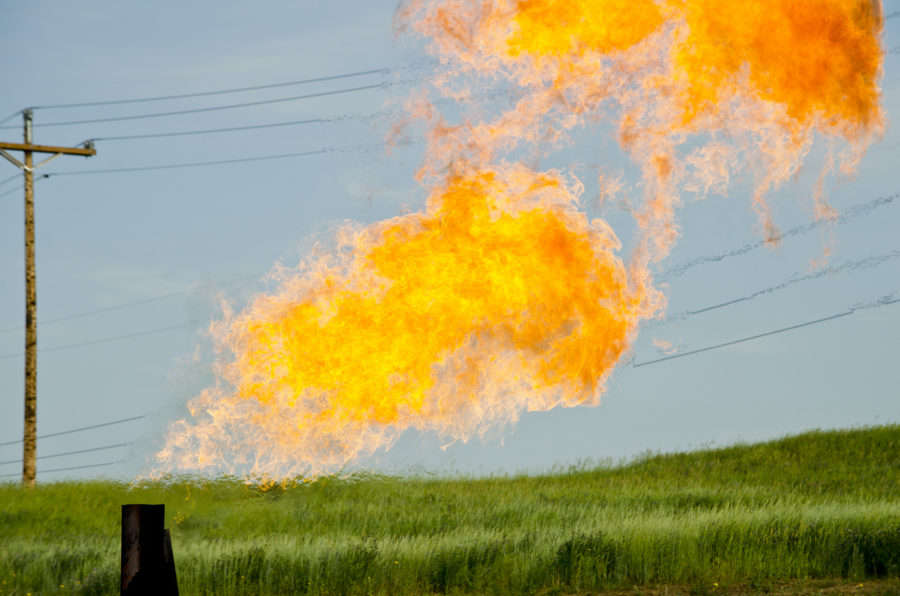 Natural gas flare by Tim Evanson used under CC BY-SA 2.0 (https://www.flickr.com/photos/timevanson/9290351154/in/photolist-f9XtJb-9QBBux-eFMhqx-awazVm-bDowqJ-f9Hegr-dSQcMY-6a5fCa-4z9Kkf-7UjBan-7UnUru-jHKy11-7ZD7ce-7dMLuE-7JKqji-7RD78C-9qLWuP-oRjqUq-bxxCXp-k5ed2g-qi9z4p-dzfcpn-qCdCQm-6bfNWz-f9HdQe-2edJm7-dfzuYd-4gg92u-4EjNgb-x6AQj-qUFNTQ-a9XrWQ-ir2by2-oiza2C-hpj13h-dCVFqn-dzCsv3-iKuXA-dD269o-nzMXYB-HQasC-azbX69-79LMXR-qCj1ni-fbap4L-pXLcBj-7wapm9-fRXUP-7yZNxX-8hcuG3)