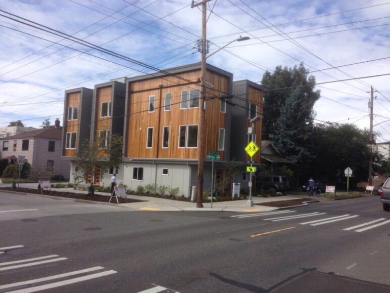 After they moved, Elisa and Devin’s home was torn down and replaced with four new rowhouses. By Alan Durning, used with permission.