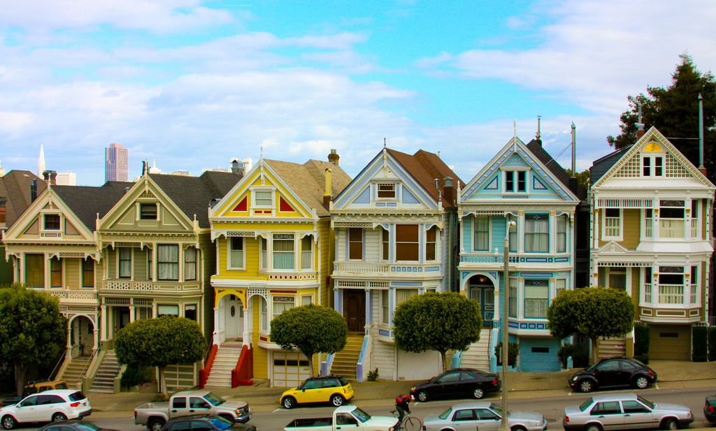 Six "painted lady" houses along a street