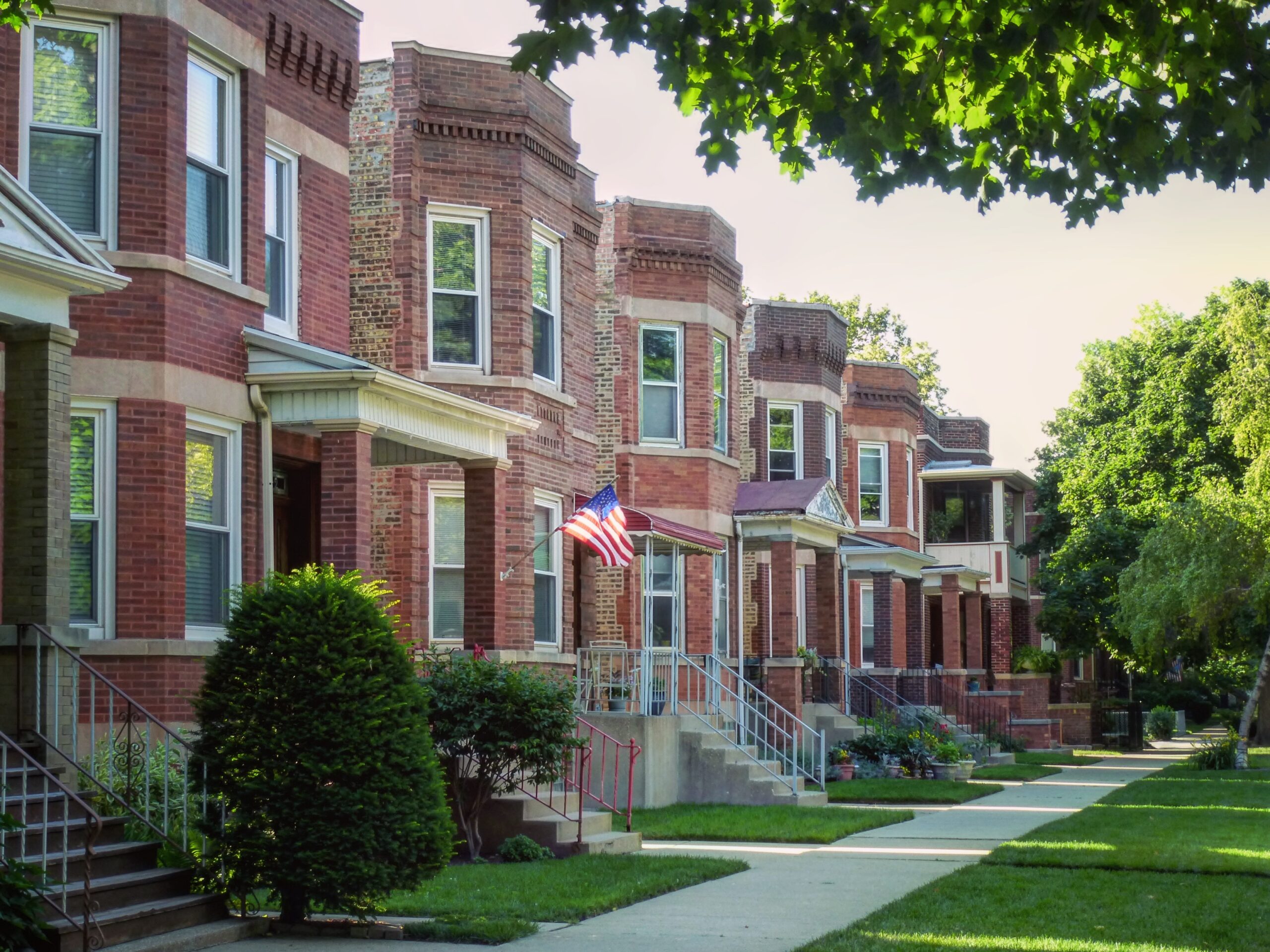 Historically, missing-middle housing was common in residential neighborhoods throughout North America, as illustrated in this row of detached “two-flat” duplex homes on a quiet street in Chicago. Photo by Dan Bertolet, used with permission.