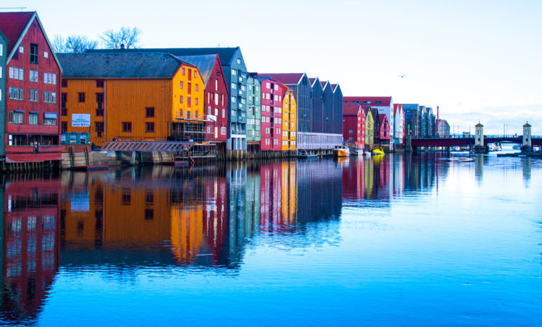 Bright, colorful homes built on the water in Norway. What can American oil-dependent regions learn from Norway's sovereign wealth funds?
