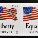 US Postal Service American Flag stamps with the words freedom, liberty, equality, and justice.