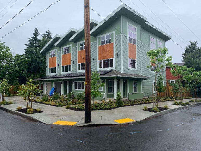 fourplex with two off-street parking spaces