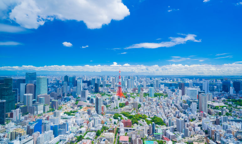 Tokyo skyline under blue sky