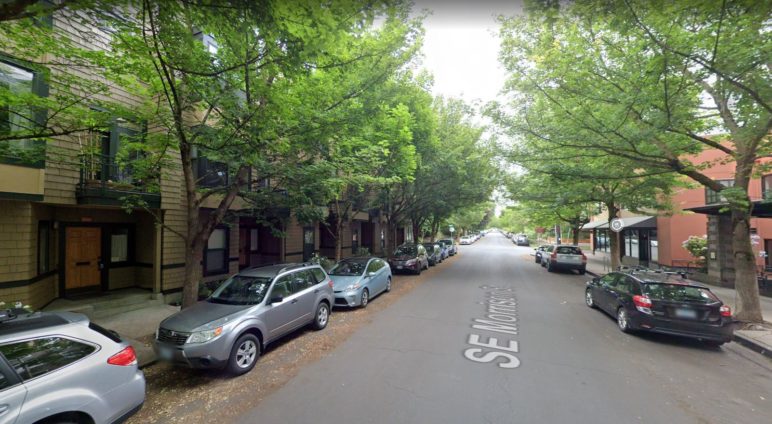 image of tree-lined street with townhomes