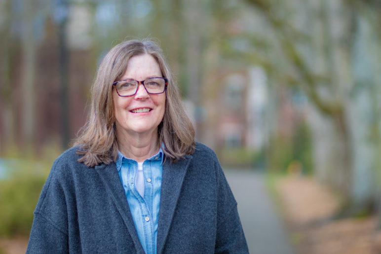 Profile photo of Mary Kyle McCurdy standing in a city park