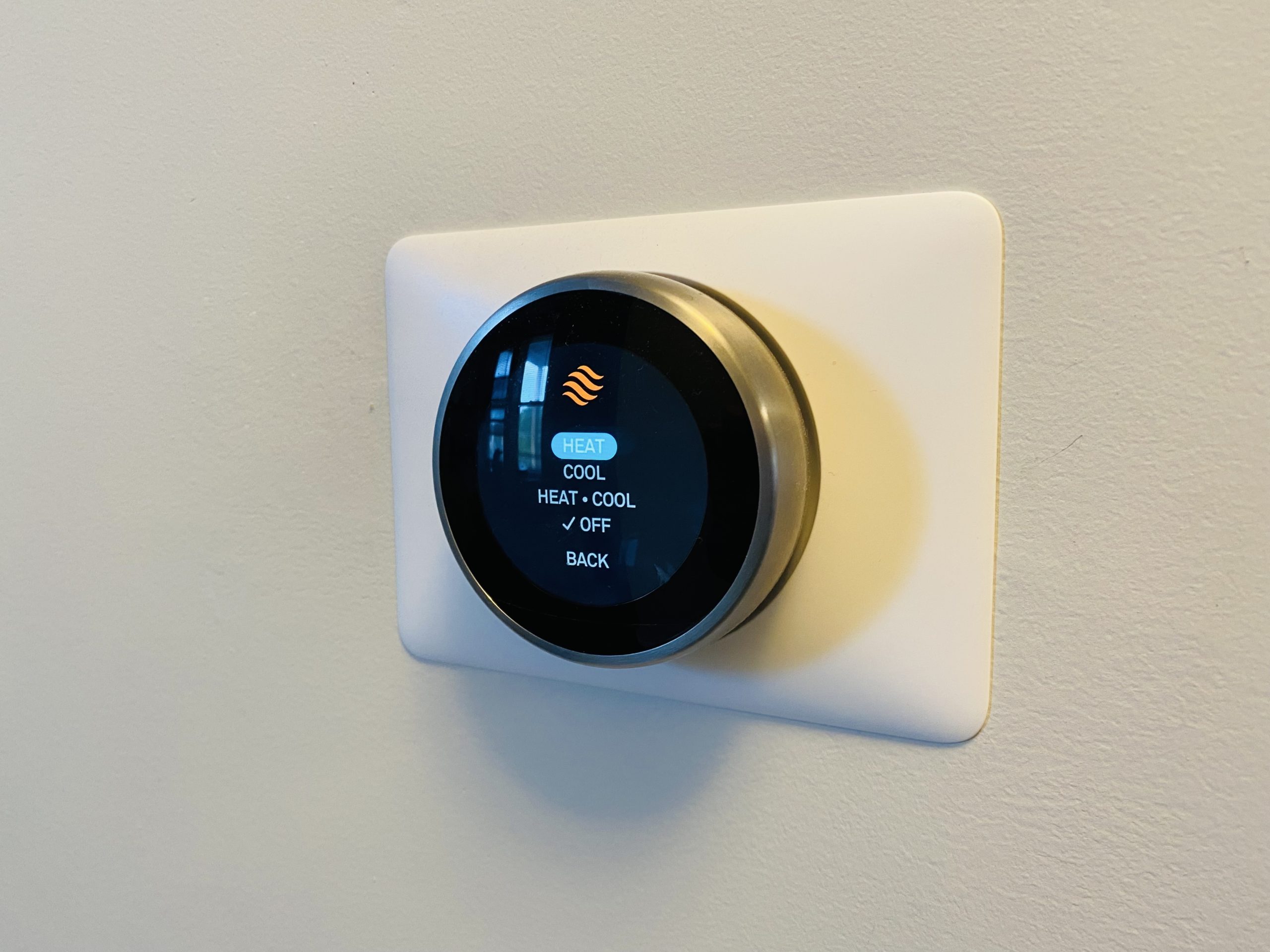 Photo of a smart home accessory (Google Nest) on the wall