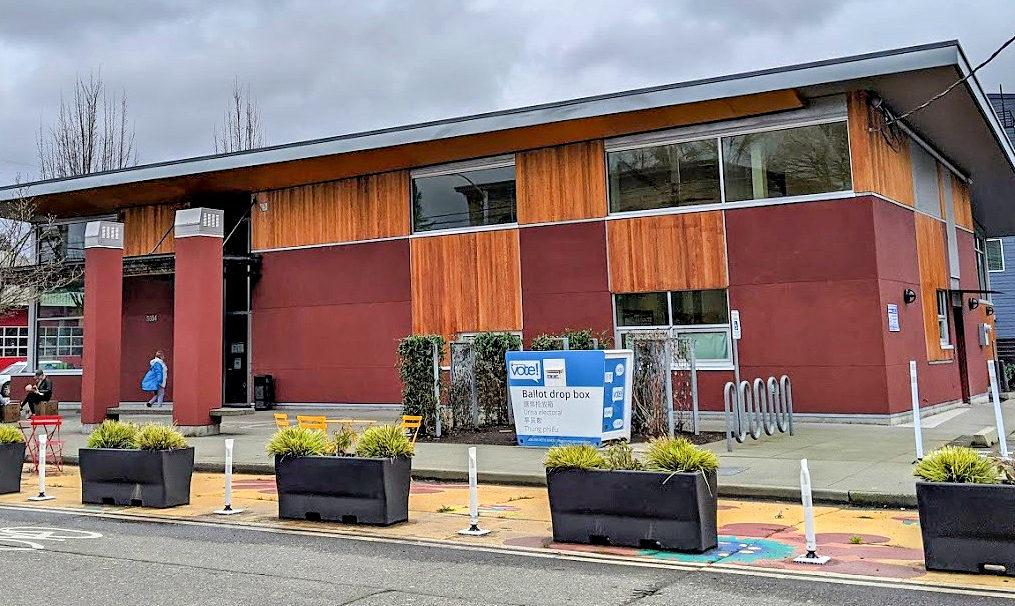 Photo of a ballot dropbox by a bike lane in Seattle, WA