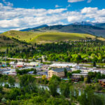 Photo of housing in Missoula admist a backdrop of a sunny, Montana day