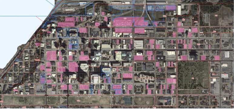 Pink highlights showing buildable lots in downtown Anchorage. Most of the highlighted lots host surface parking. (Image Credit: Municipality of Anchorage, Anchorage Downtown District Plan 2021) 