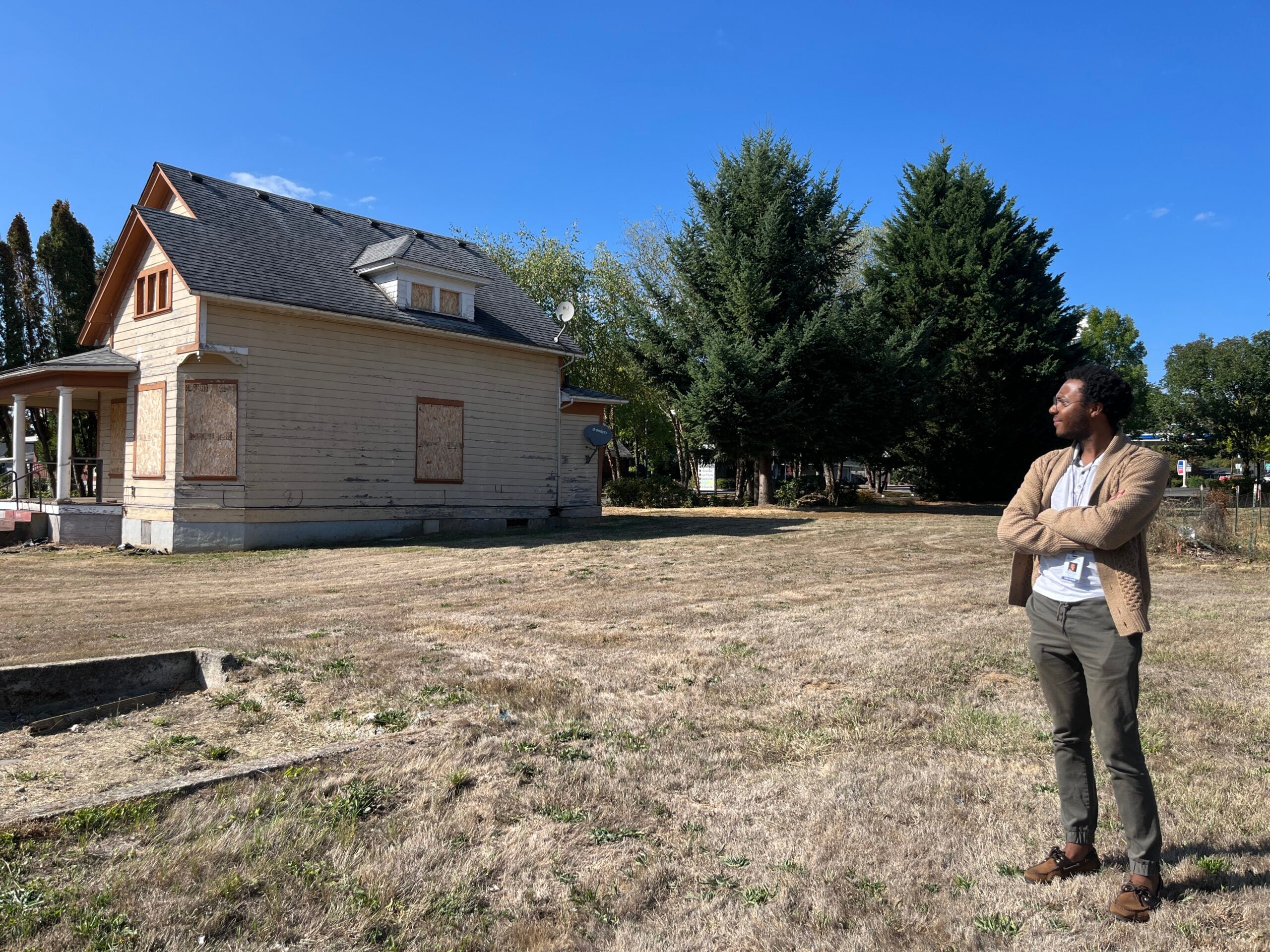 Victor Ceasar at the site of a future affordable housing project that sparked Washougal to increase its parking minimums. Photo by Catie Gould.