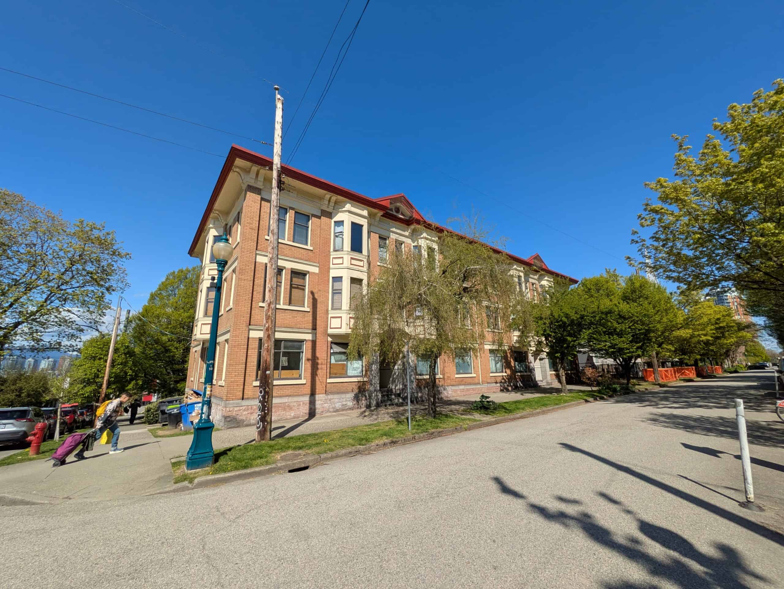 A single-stair apartment building at Ontario and 10th in Vancouver (Daniel Oleksiuk, 2025). 