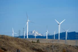 wind turbines and transmission lines in front of Mt Stuart WA_steve estvanik_shutterstock