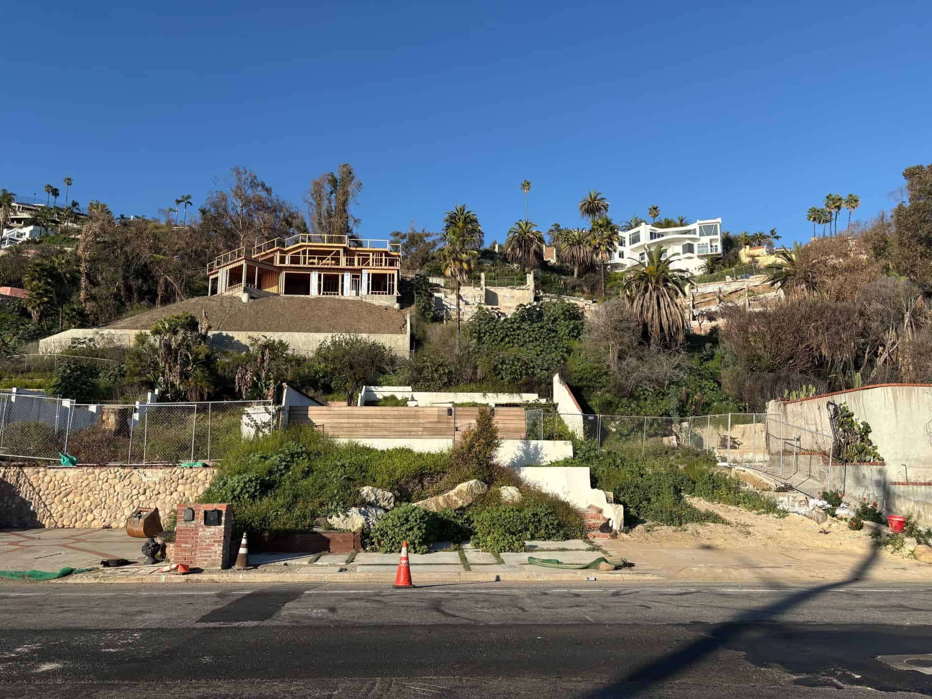 Rebuilding is already underway on properties throughout the affluent and still fire-prone Pacific Palisades neighborhood after the January 2025 wildfires that swept through Los Angeles. Photo by Emily Moore.