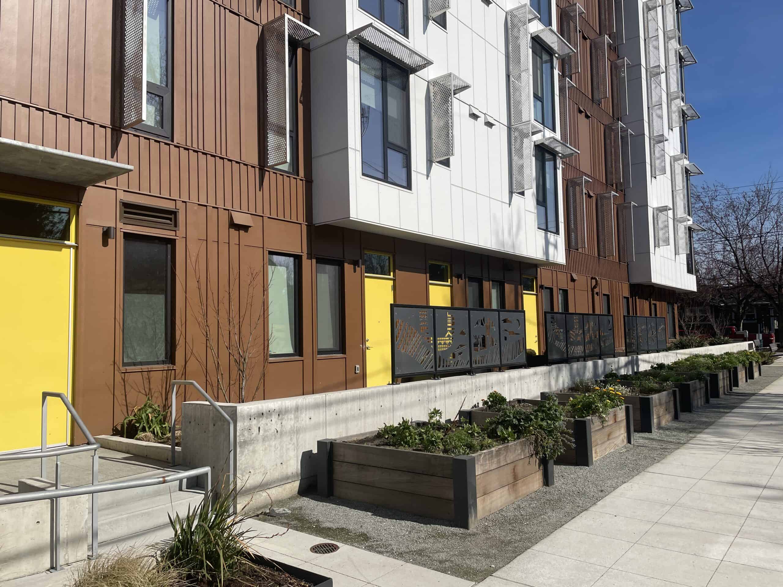 Ground-floor apartment homes in Seattle’s Africatown Plaza. Photo by Dan Bertolet.  
