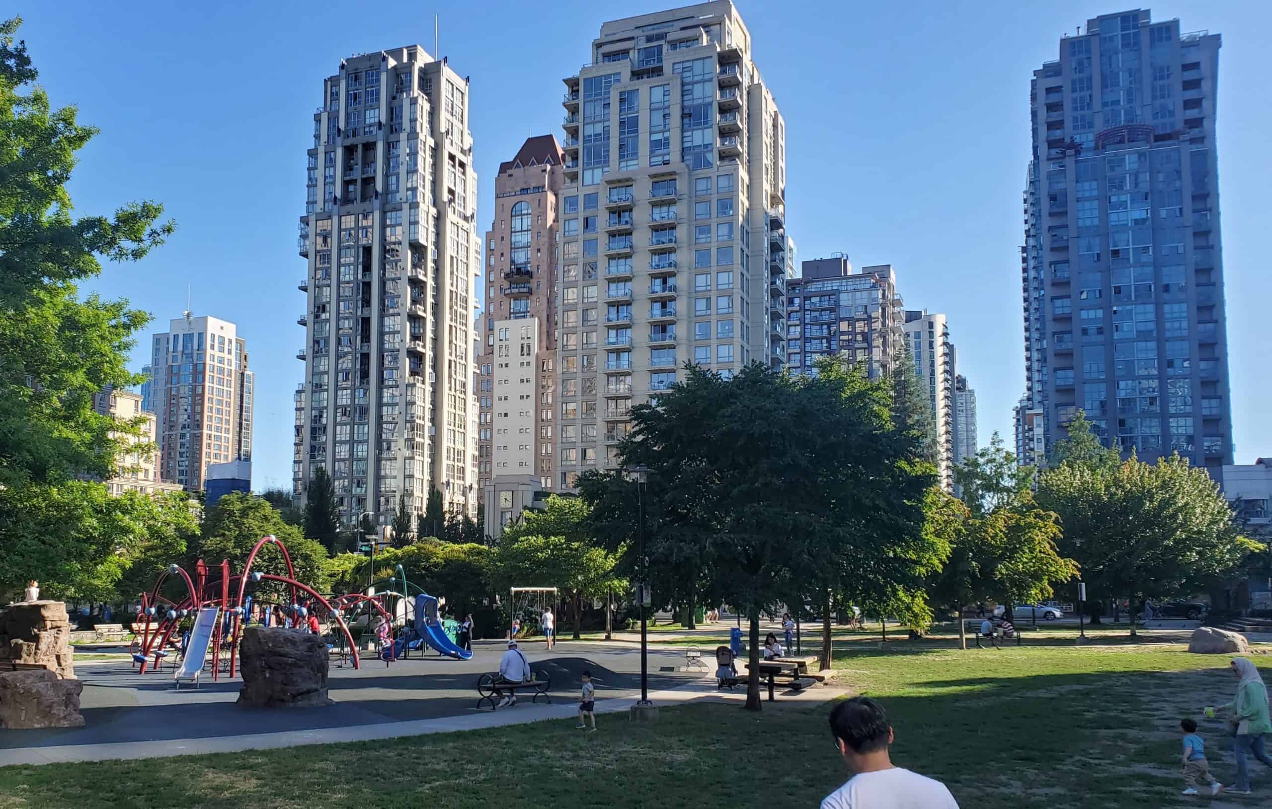 The slender form of these typical Vancouver, BC, scissor stair highrises helps preserve light and views for both residents and park goers. Photo by Markus Johnson. 