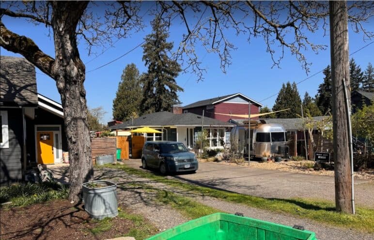 A front yard Airstream from 2024 (left) was removed by 2026 (right). Photos by Kol Peterson (left) and Catie Gould (right). 