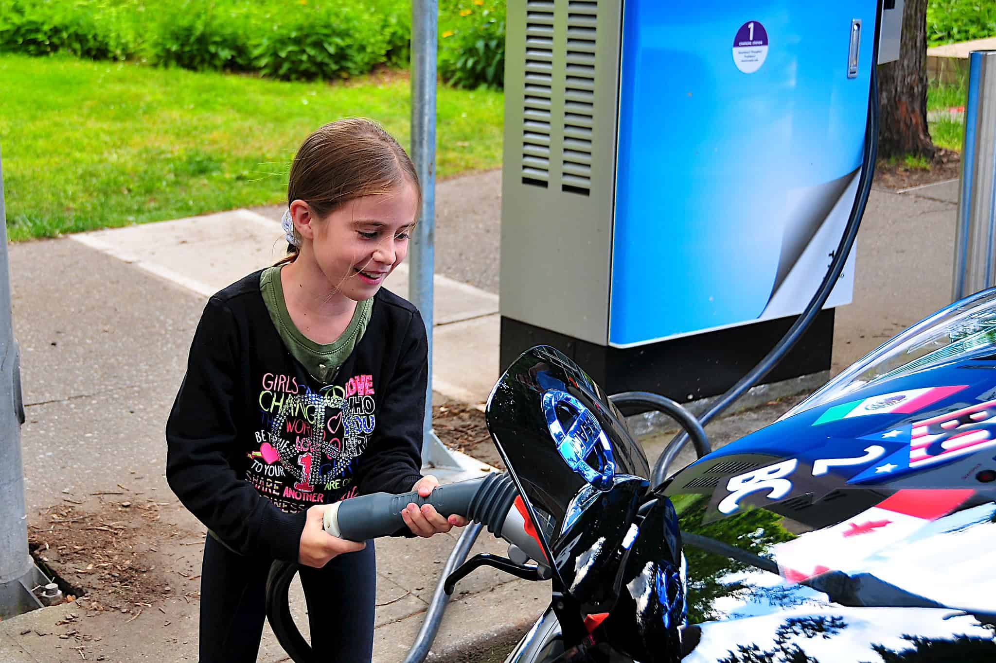 Helping to charge up an electric car.