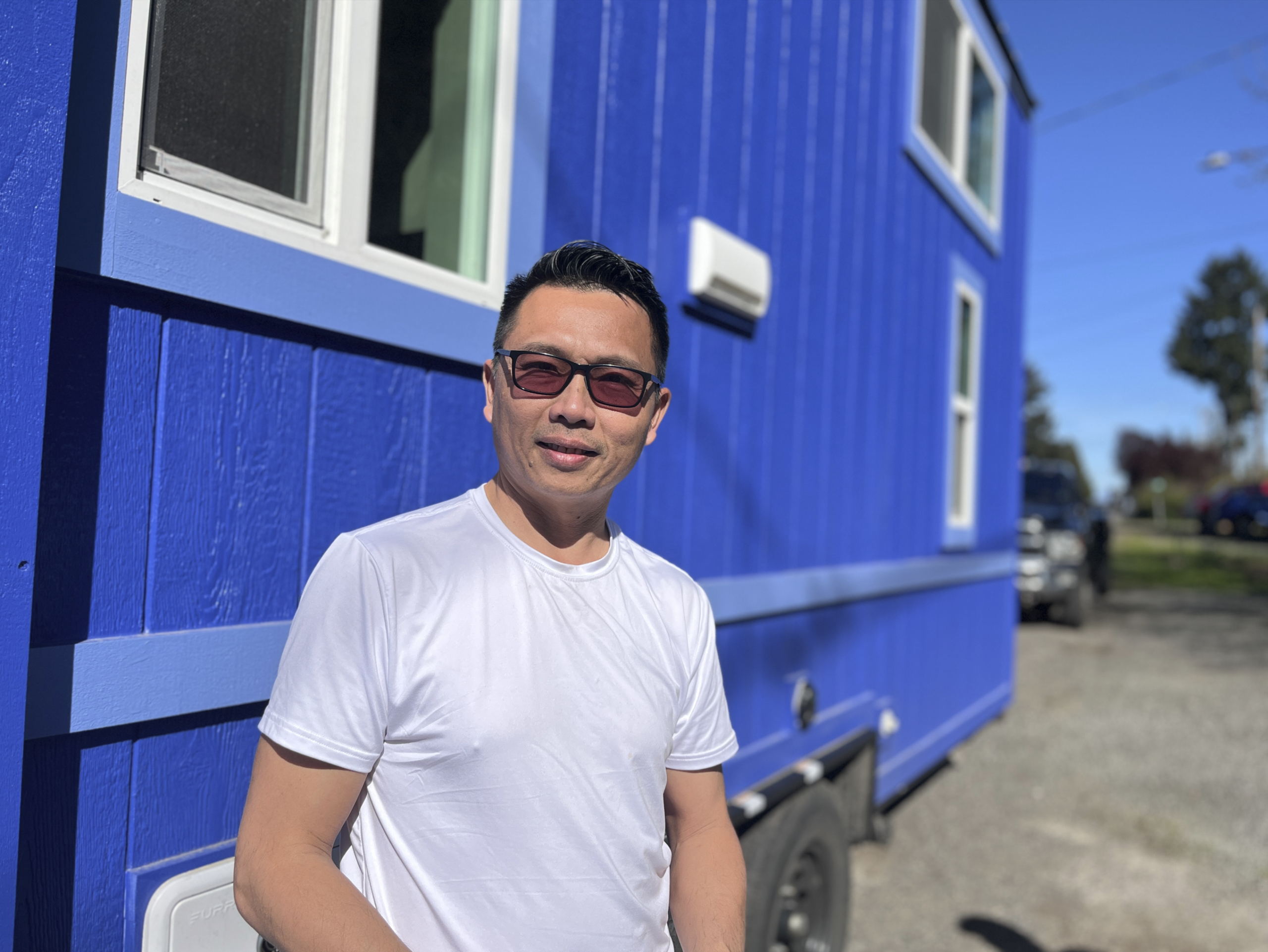 Linh Phan runs a business parking mobile dwellings in Portland. Photo by Catie Gould. 