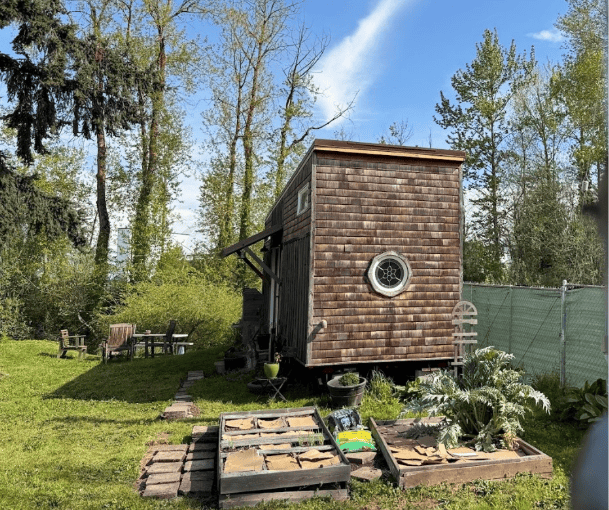 This tiny home on wheels has been on this lot since spring 2019, two years before Portland officially legalized mobile dwellings. Photo by Kol Peterson.  